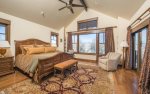 Jr. Master suite with king bed, views, and en suite bathroom with Jacuzzi tub.